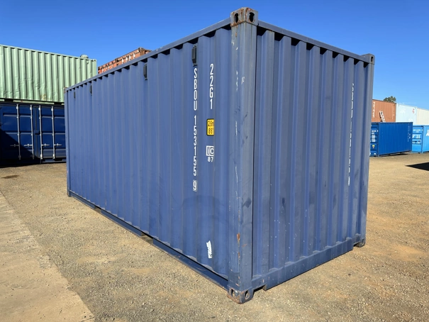 Back corner of a grade 7 20ft container, slightly rusted.